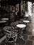 Paris, France, Parisian cafe, tables and chairs on paved sidewalk, black and white photo