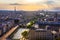 Paris, France, Seine river cityscape in summer colors with birds flying over the city. Paris city aerial panoramic view. Paris is