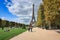 Paris, France - September 17, 2022: People on the walk at Park Champ de Mars by the Eiffel Tower in Paris. France