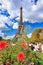 Paris, France - September 17, 2022: People on the walk at Park Champ de Mars by the Eiffel Tower in Paris. France