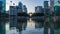 Paris, France - Timelapse - Lights Reflections on Water Mirror at La Defense Business District During Sunet