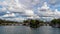 Paris, France - Timelapse - Sunny and Cloudy Day over Paris Center Seine River and Bridges Boats Architecture Trees