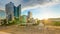 Paris La Defense business district skyline and its office buildings at sunset timelapse. Paris, France