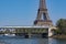 Paris metro crossing Pont de Bir-Hakeim and Eiffel Tower