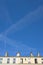 Paris residential buildings roof and back faced facade under a blue summer sky