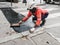 Paris street maintenance worker patches street