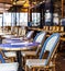 Paris. Street view of a Bistro with tables and chairs. Cafe pari