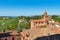 Parish church and green vineyards in Italy.