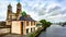 The parish church of Ss. Peter and Paul with their green domes beside the river Shannon in Athlone town