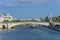 Parisian bridge on the Seine river on sunny day