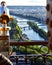 Parisian cityscape from the Eiffel Tower viewpoint with spyglass. Paris, France.