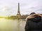 Parisian French man watching the flooding swollen Seine river