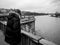 Parisian French man watching the flooding swollen Seine river