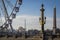 Parisian landscape of the Place of the Concorde in Paris with its famous fountain, the Ferris wheel and the Eiffel Tower in the