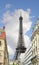 The Parisian street against Eiffel Tower in Paris.