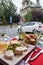 Parisians and tourists enjoy food and drinks in cafe in Paris, France