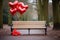 A park bench adorned with vibrant balloons, providing a lively touch to the serene atmosphere of the outdoor seating area, An