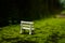 A park bench on green surface with a nice blurry bokeh effect. miniature photography art, light bokeh, photography, background,