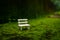 A park bench on green surface with a nice blurry bokeh effect. miniature photography art, light bokeh, photography, background,