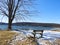Park bench lake view in winter on Otisco Lake