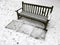 Park Bench in the Snow in March