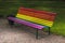 Park bench in vibrant pride colors