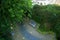 Park with benches, footpath and trees, summer