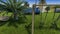 Park in the heart of Jeddah with with grass and palm trees at daylight