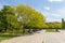 Park at NDK boulevard. People resting on benches, Sofia, Bulgaria.