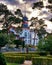 Park with old Baltic house with trees in the sunshine on the beach promenade Zinnowitz on the island of Usedom