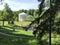 Park Pavilion-Rotunda `Temple of Friendship`, stylized as antiquity, in Pavlovsk Park on a summer sunny day