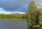 Park on shore of picturesque lake Vanajavesi in Hameenlinna, Finland. Autumn landscape