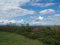 Park and sky on top hill near power plant and mine