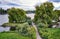 Park with small island on the Schwerin lake. Mecklenburg-Vorpommern, Germany