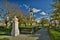 Park with statue and Church of St. Margaret of Antioch at Zohor village