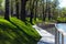 Park in summer. wooden lakeside promenade, a place for outdoor recreation