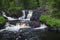 Park of waterfalls on the Tohmajoki river near the Ruskeala village in Karelia