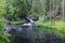 Park of waterfalls on the Tohmajoki river near the Ruskeala village in Karelia