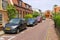 Parked autos on picturesque street in Zandvoort, the Netherlands