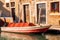 Parked boats, gondolas transport movement Grand Canal Venice, Italy.