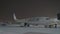 Parked Boeing 737 MAX-8 FlyDubai in Sheremetyevo Airport at winter night