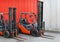 Parked Forklifts in warehouse front