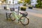 Parked green vinatge bike in the coastal town Bansin on the island Usedom, Germany