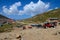 Parked jeeps in mountains around Lake Saiful Muluk North Pakistan