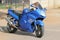 Parked large blue Honda motorbike at Yearly Mass Ride