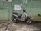 Parked moped. Two wheeled vehicle. urban environment