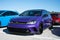 Parked purple Volkswagen Golf car