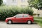 Parked red Opel Astra