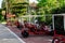 Parked rental tourist trike vehicles on one of the streets in Alcudia