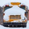 Parked school bus winter blizzard snow cover